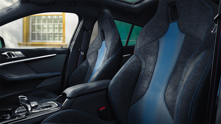 Ergonomically shaped M Sport seats in the BMW 1 Series F40 with contrast stitching and integrated headrest.