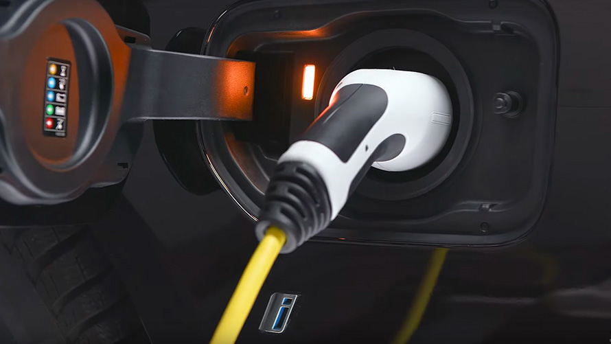 BMW 3 Series Sedan G20 BMW plug-in hybrid connected with charging cable  BMW 3 Series Sedan G20 Charging accessories for BMW plug-in hybrid in bag close-up