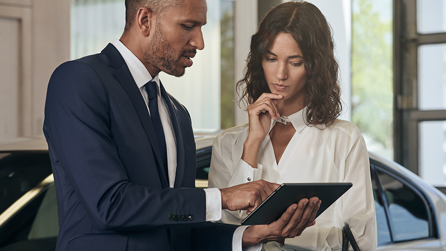 BMW employee advises a customer BMW employee advises a customer