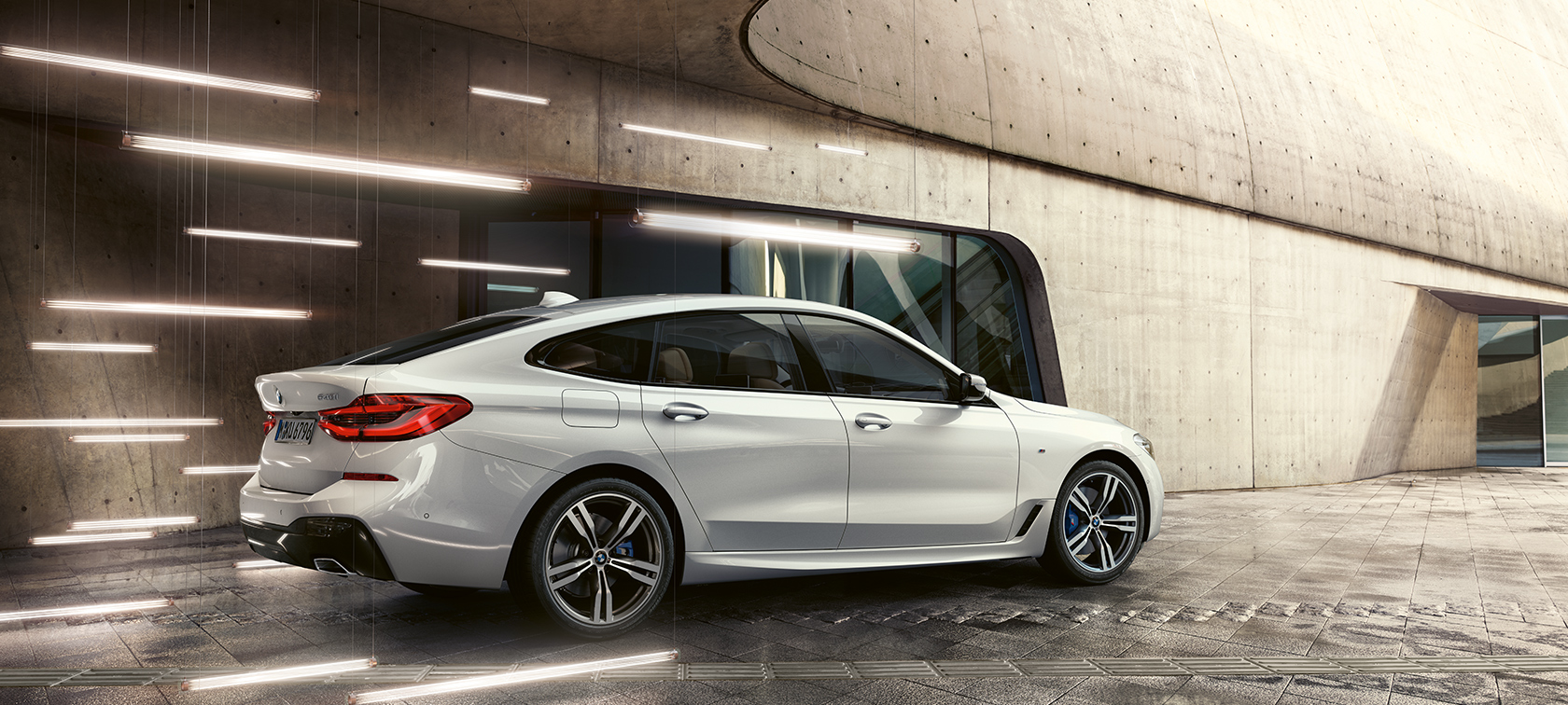 BMW 6 Series Gran Turismo G32 three-quarter rear view BMW 6 Series Gran Turismo G32 2017 Mineral White metallic three-quarter rear view