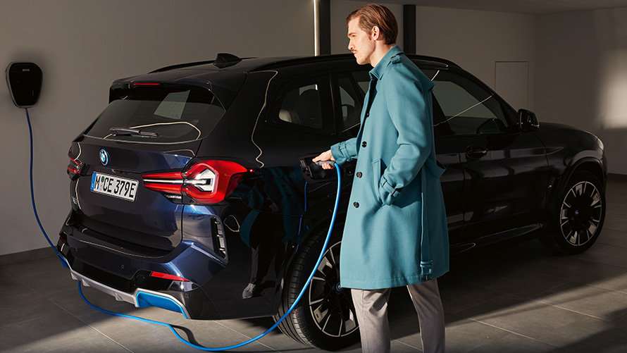 BMW iX3 G08 2021 electric SAV charging at a public high power charging station