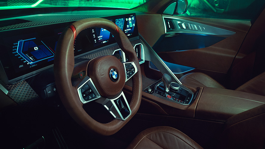 BMW Concept XM (G09) cockpit interior view close-up steering wheel
