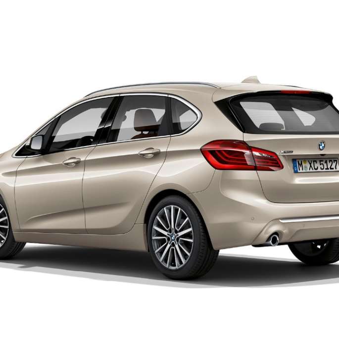 BMW 2 Series Active Tourer Model Luxury Line 225i xDrive F45 Jucaro Beige metallic three-quarter rear view